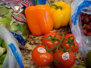 Tomatoes and 1 Orange and 1 Yellow Bell Pepper