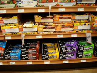 Various boxes of bars on shelves
