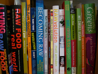 Shelf holding various cookbooks