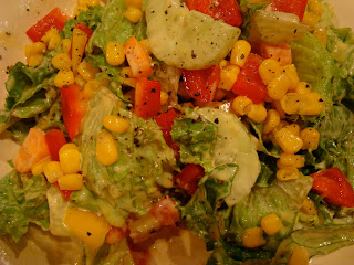 Sweet Mango & Lime Corn Salsa on top of green salad