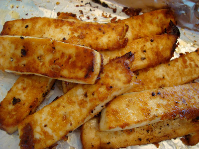 Sesame Ginger Maple Glazed Tofu on foil lined pan