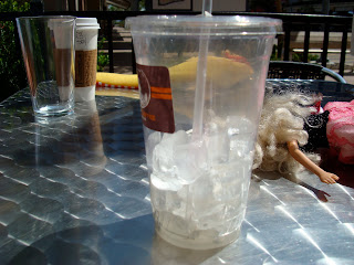 Empty plastic coffee cup with ice