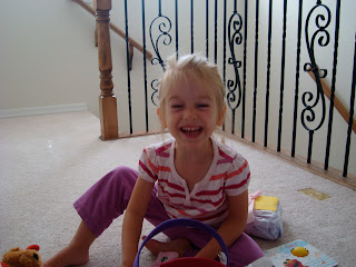 Young girl looking in Easter basket