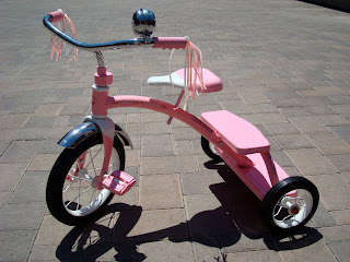 Pink Tricycle with tassels and bell