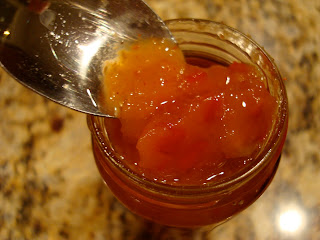 Spoon spooning out some Mango Ginger Chutney