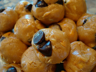 Chocolate Chips sticking out of No-Bake Vegan Peanut Butter Chocolate Chip Cookie Dough Balls