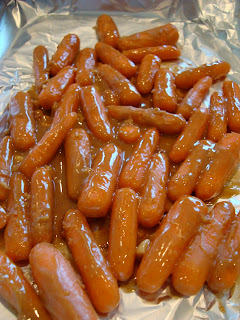 Overhead ov glazed carrots on pan