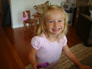 Smiling young girl in pink shirt