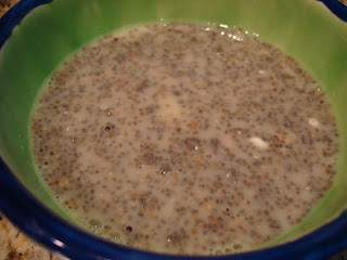 Mixed up chia pudding in green and blue bowl