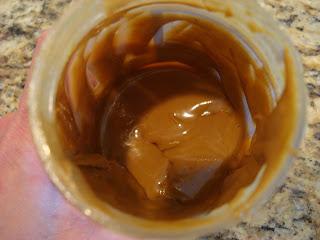 Almost empty jar of sunflower seed butter