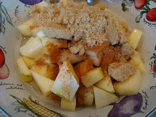 Diced apples, cinnamon, brown sugar and agave in bowl