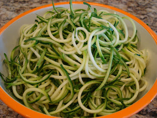 Three spiralized zucchini in bowl