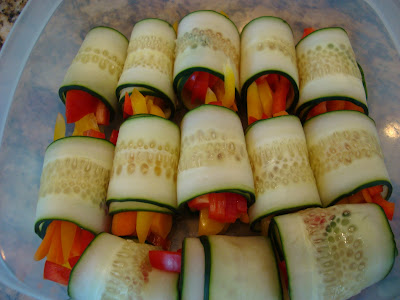 Overhead of Raw Vegan Cucumber Wraps in clear container