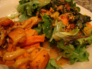 Roasted Sweet Potatoes and Carrots with side salad on plate