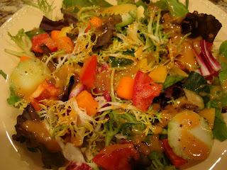 Overhead of salad with Thai-inspired peanut sauce