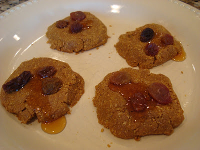 No-Bake Vegan Maple Flaxseed Cookies topped with raisins and syrup