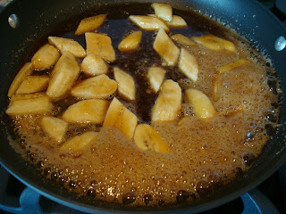 Vegan Banana Foster with melted caramel and bananas in skillet