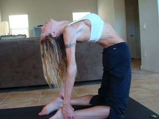 Woman doing Camel yoga pose