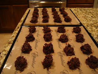 Shaped Chocolate Macaroons on lined dehydrator trays