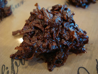 Close up of finished Vegan Chocolate Macaroons on lined tray