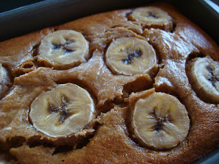 Close up of Vegan Peanut Butter Banana Bread with banana slices on top