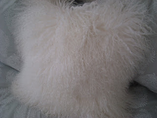 White fluffy and fuzzy accent pillow