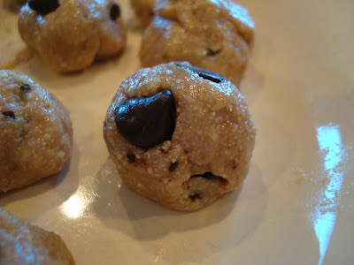 Close up of High Raw Vegan Chocolate Chip Cookie Dough Balls on plate