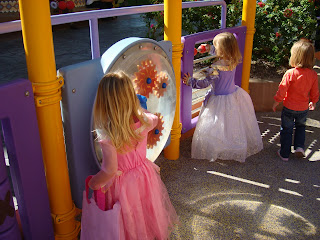 Young girl in dress with other children