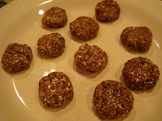 Dough shaped into cookies on white plate