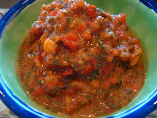 Marinara sauce poured into green and blue bowl