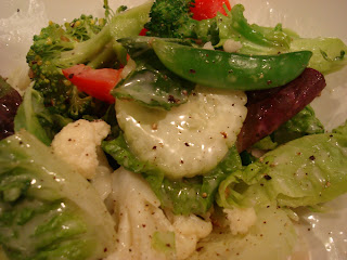 Salad tossed with Raw Vegan Creamy Tahini Dressing