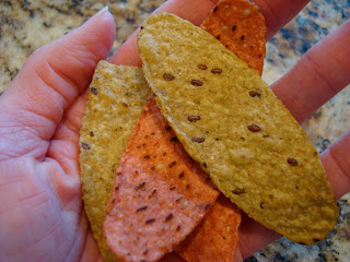 Hand holding some Tortilla Dippers