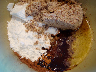 Melted butter with remaining ingredients to make crust for bars in bowl 