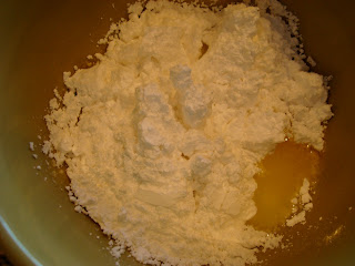 Powdered sugar added to melted butter and Creme de Menthe