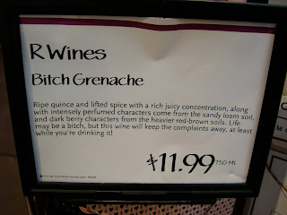 Sign that says R Wines Bitch Grenache