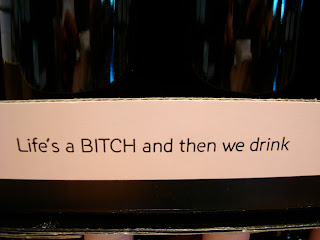 Slogan on wine: Life's a Bitch and then we drink