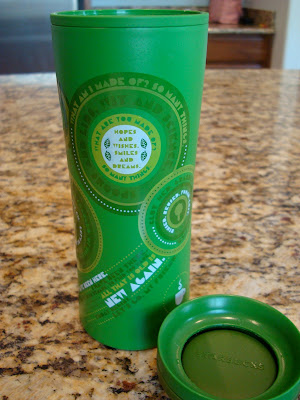 Green Coffee Go Cup on countertop with lid off