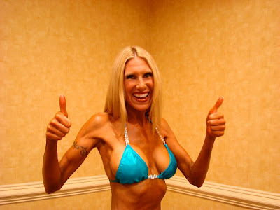 Woman giving thumbs up in bikini