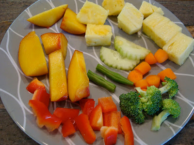 Mixed fruits and vegetables on plate