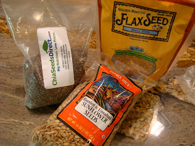 Chia Seeds, Flaxseeds and Sunflower Seeds on countertop