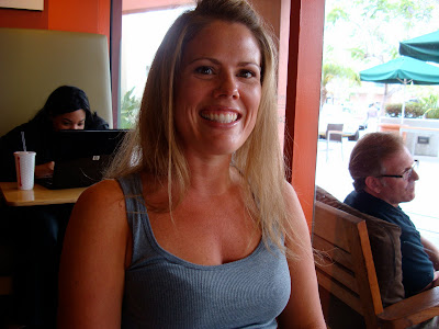 Woman sitting in chair smiling