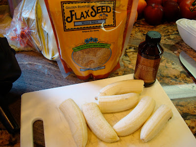 Sliced up bananas on cutting board