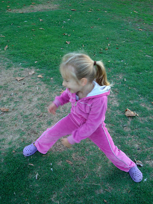 Young girl running at park