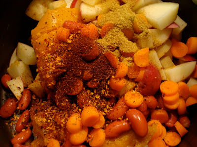 Ingredients for soup added to pot