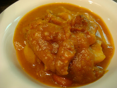 Close up of Savory Pumpkin, Potato, & Carrot Soup in white bowl