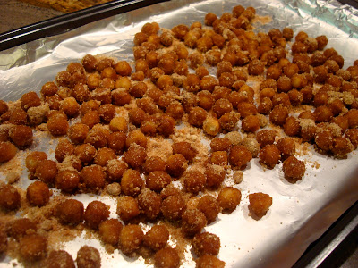 Chickpeas spread onto foil lined pan