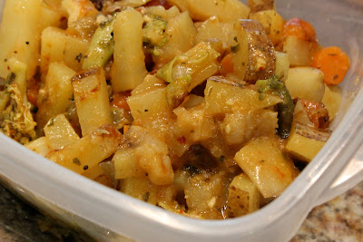 Side view of Cheezy Vegetable Bake in container