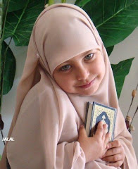 Litle girl with holy Qur'an