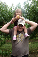 Jer and K picking peaches