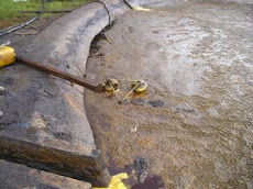OIL SKIMMER IN ACTION at Palm Oil Mill  For Floating Oil Recovery